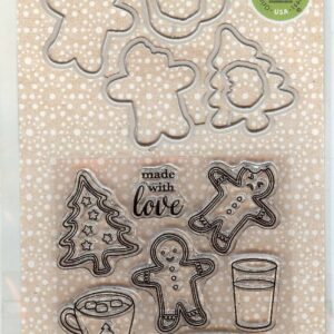 A set of cookie cutters and a cup on a card.
