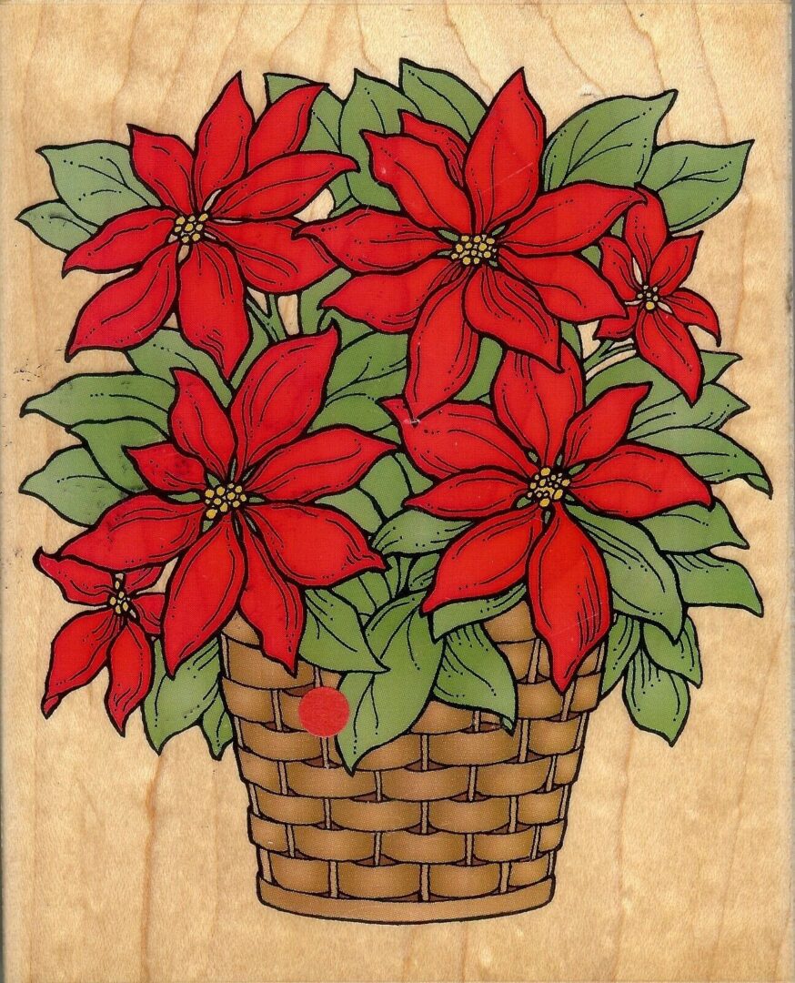 A basket of poinsettia flowers on a wooden surface.