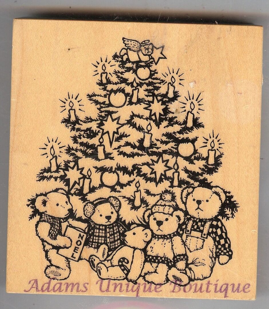 A group of teddy bears sitting under a christmas tree.