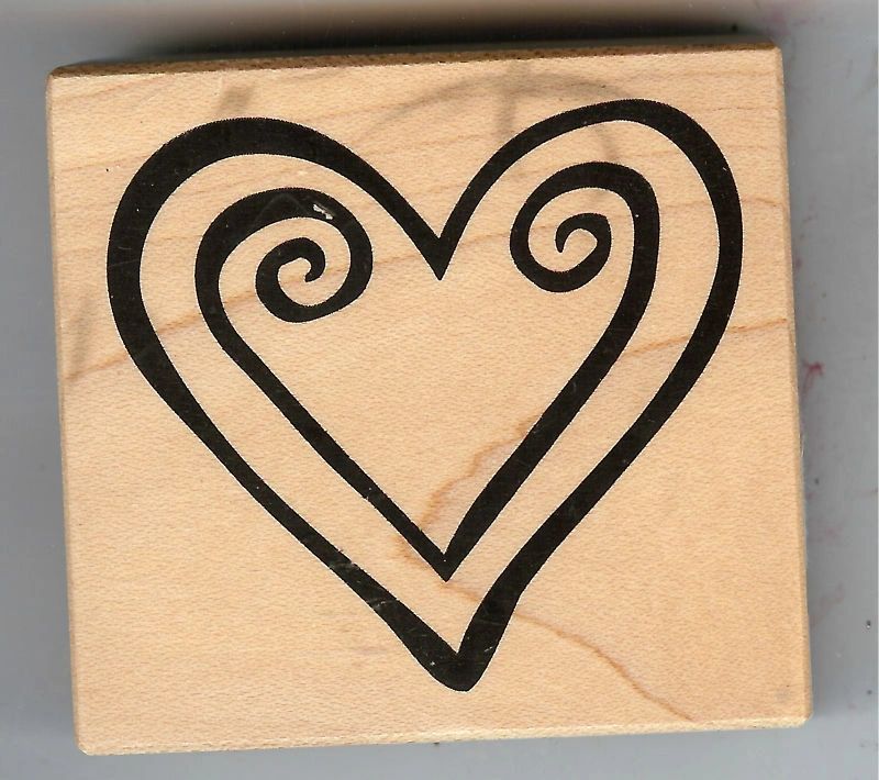 A heart with swirls drawn on it's side.