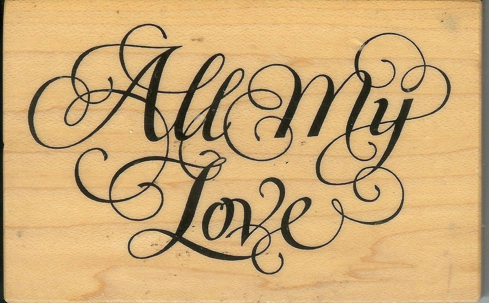 A wooden plaque with the words " all my love ".