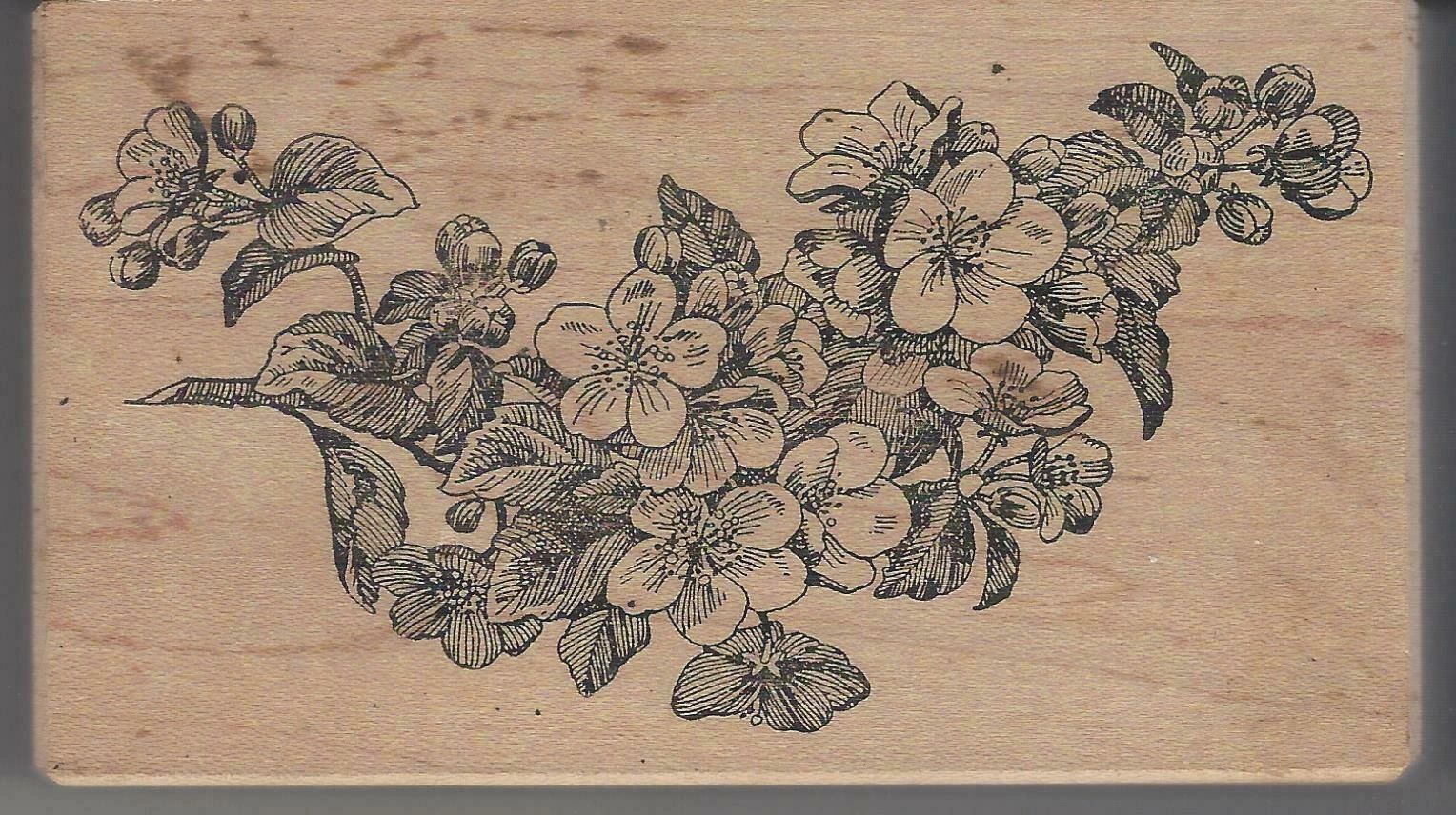 A wooden block with flowers on it