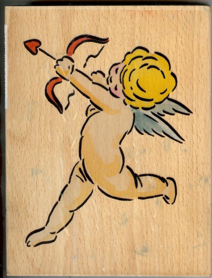 A wooden picture of an angel holding a heart and arrow.