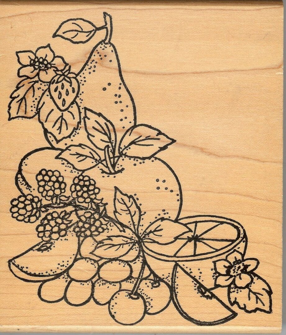 A wooden picture of fruit and flowers.