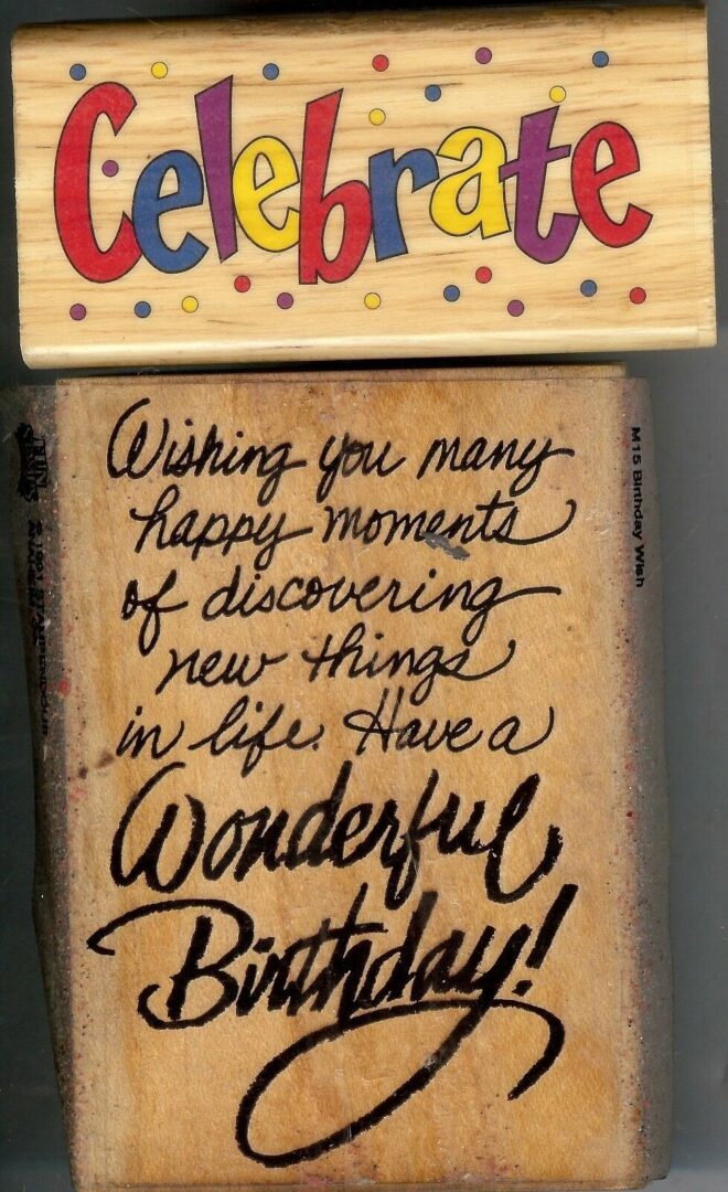 A wooden block with some writing on it