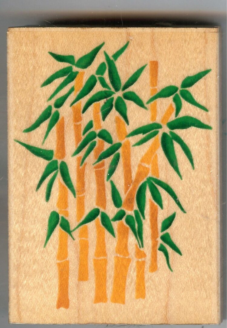 A painting of bamboo trees with green leaves.