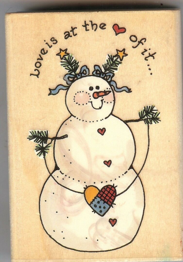A snowman with a heart on it's head.