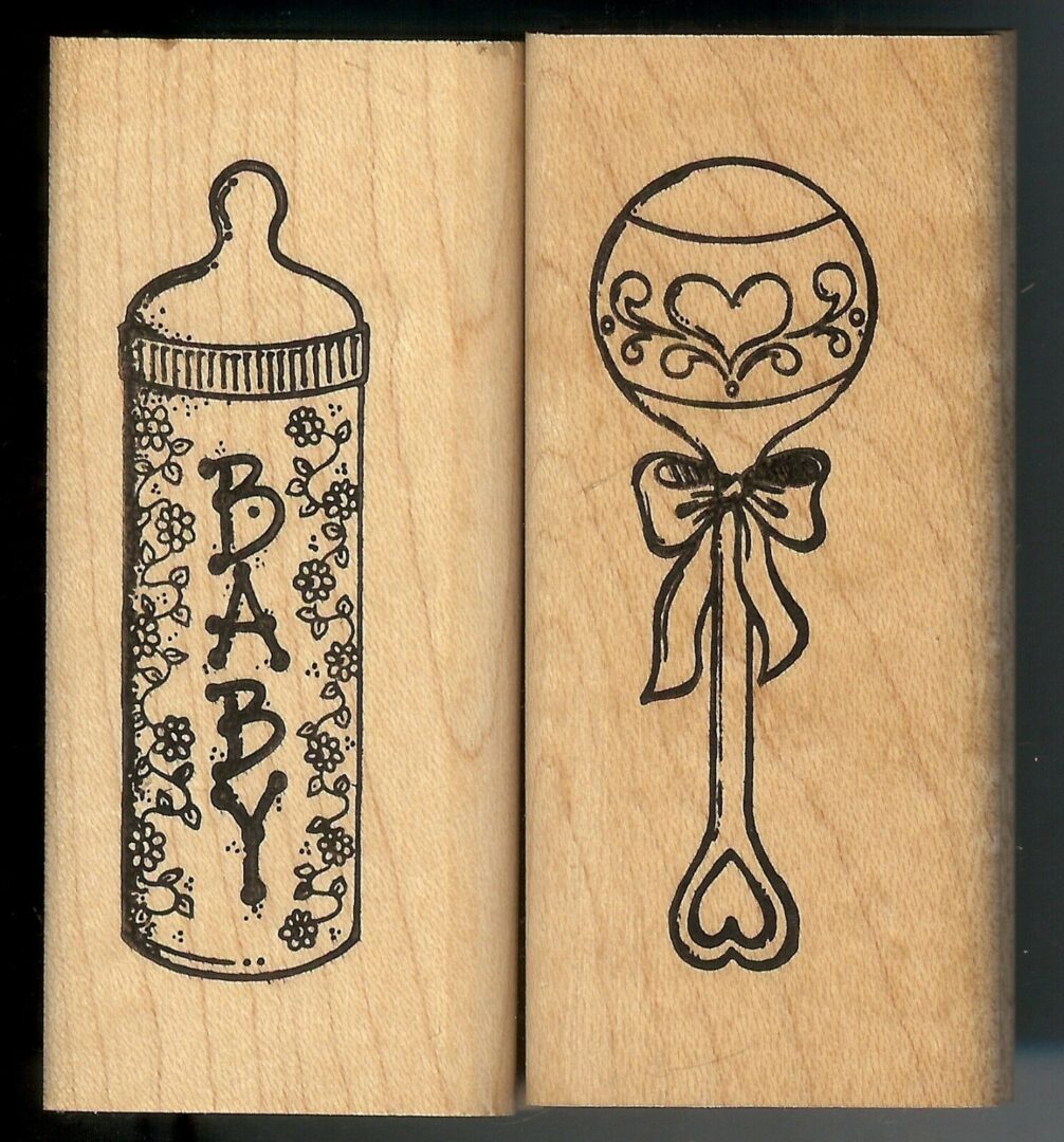 A baby bottle and a spoon rubber stamp
