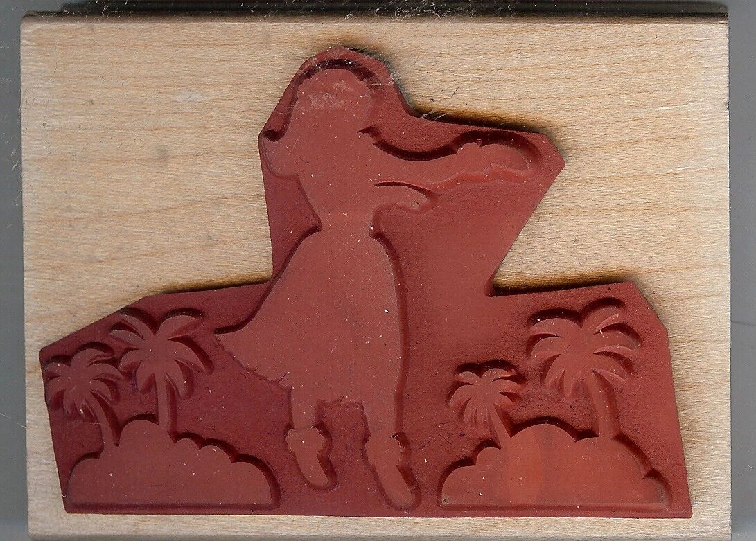 A wooden plaque with a picture of a woman in the background.