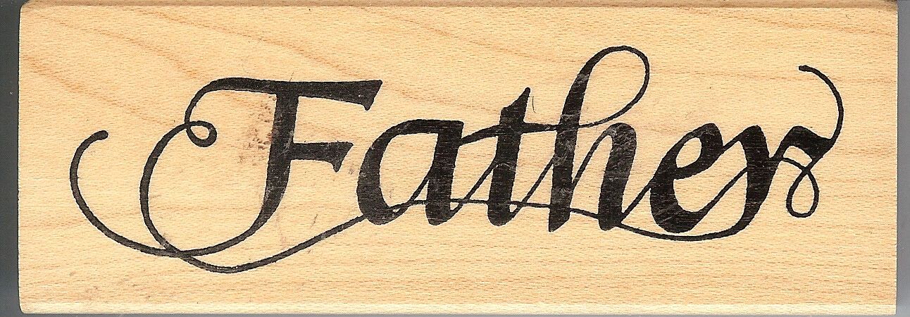 A wooden stamp with the word " faith ".