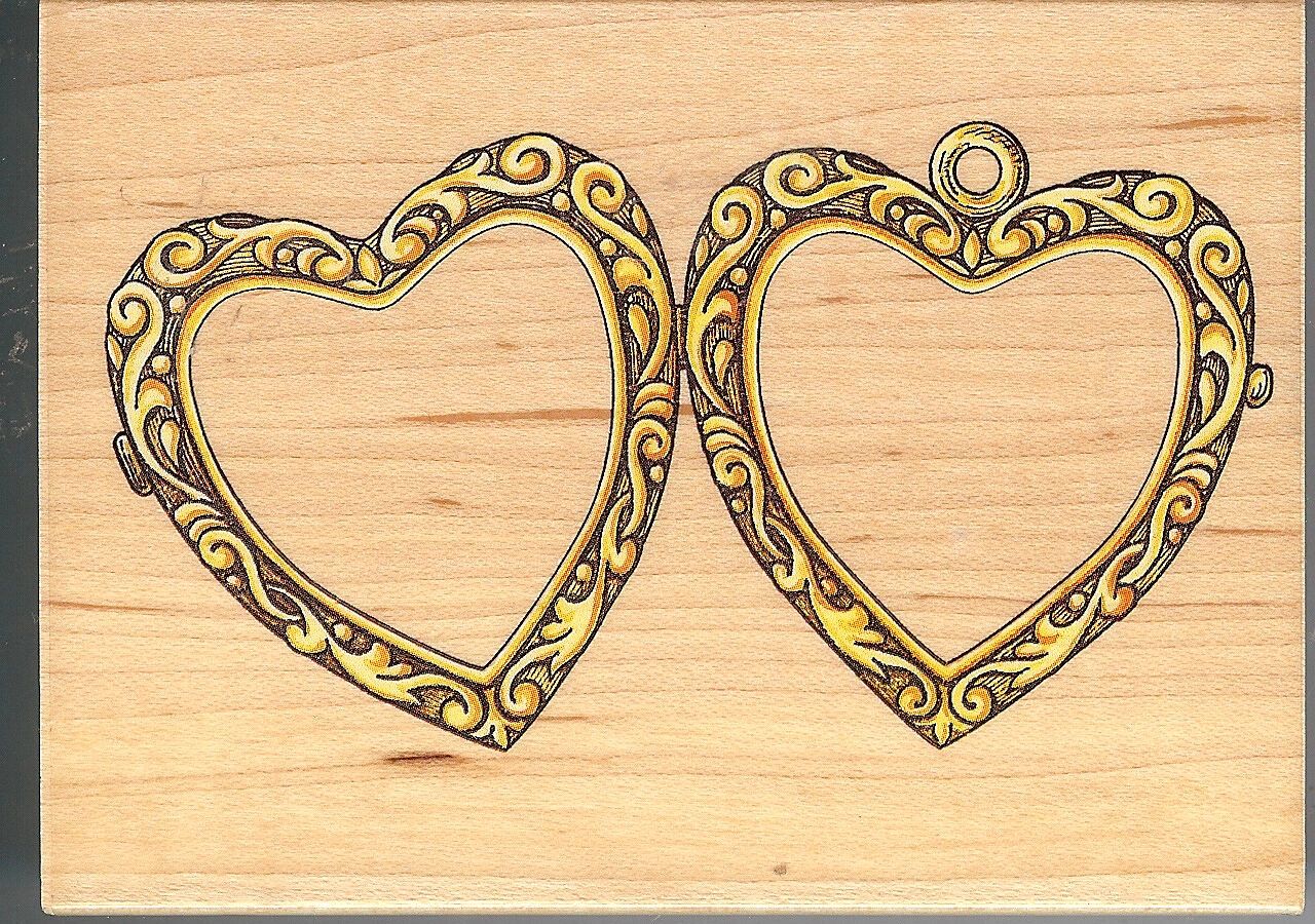 A wooden picture frame with two hearts drawn on it.