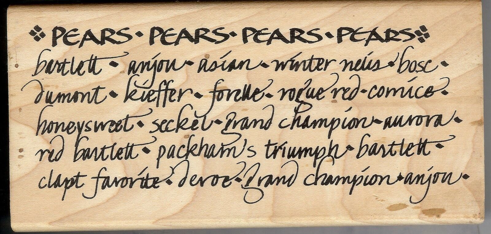A wooden plaque with some writing on it