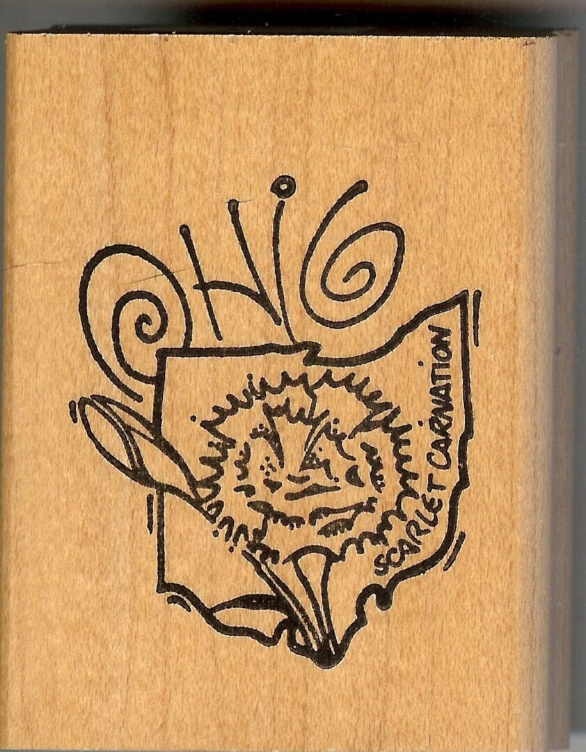 A wooden stamp with the state of ohio and an image of a sunflower.