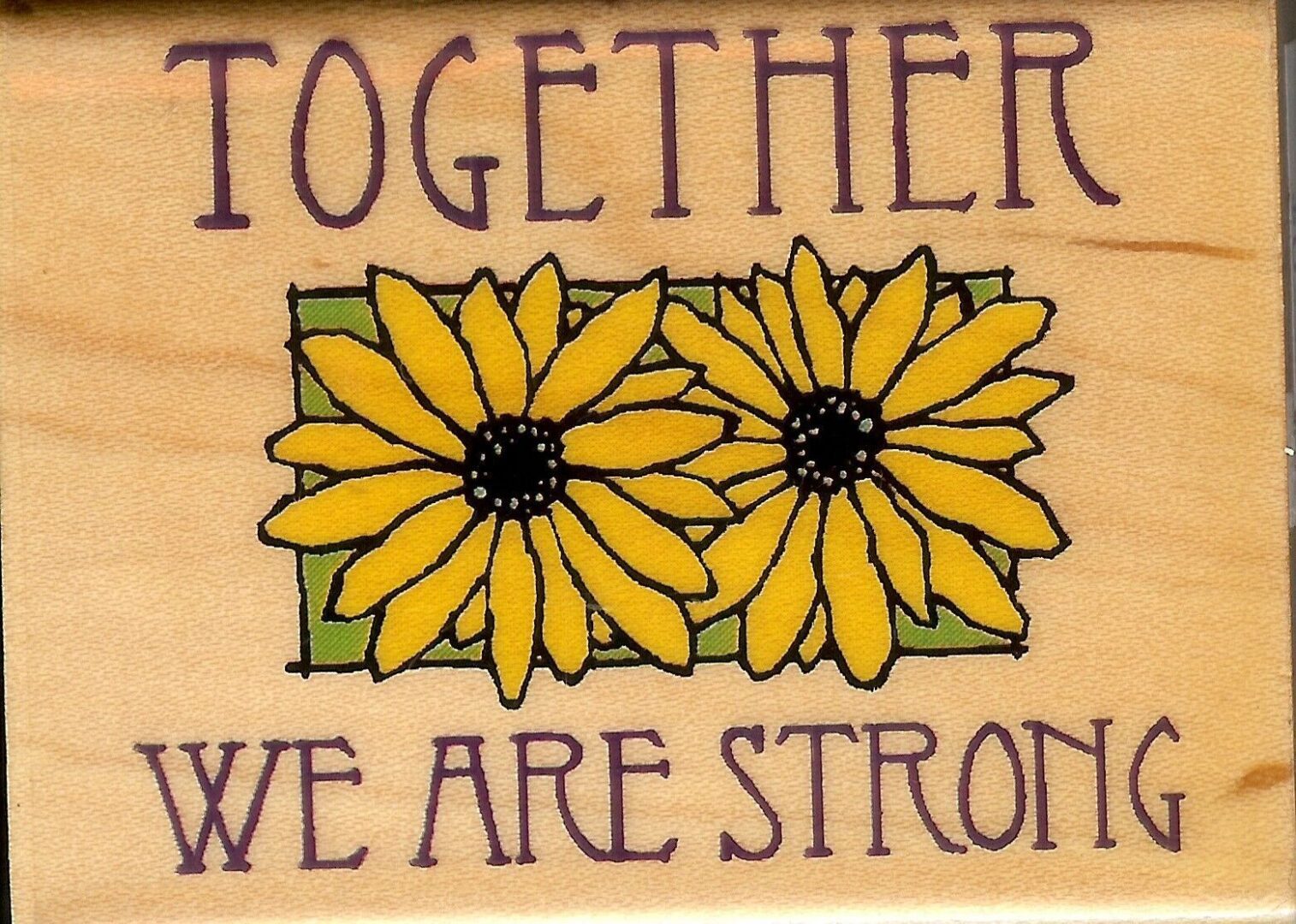 A wooden sign with the words together we are strong
